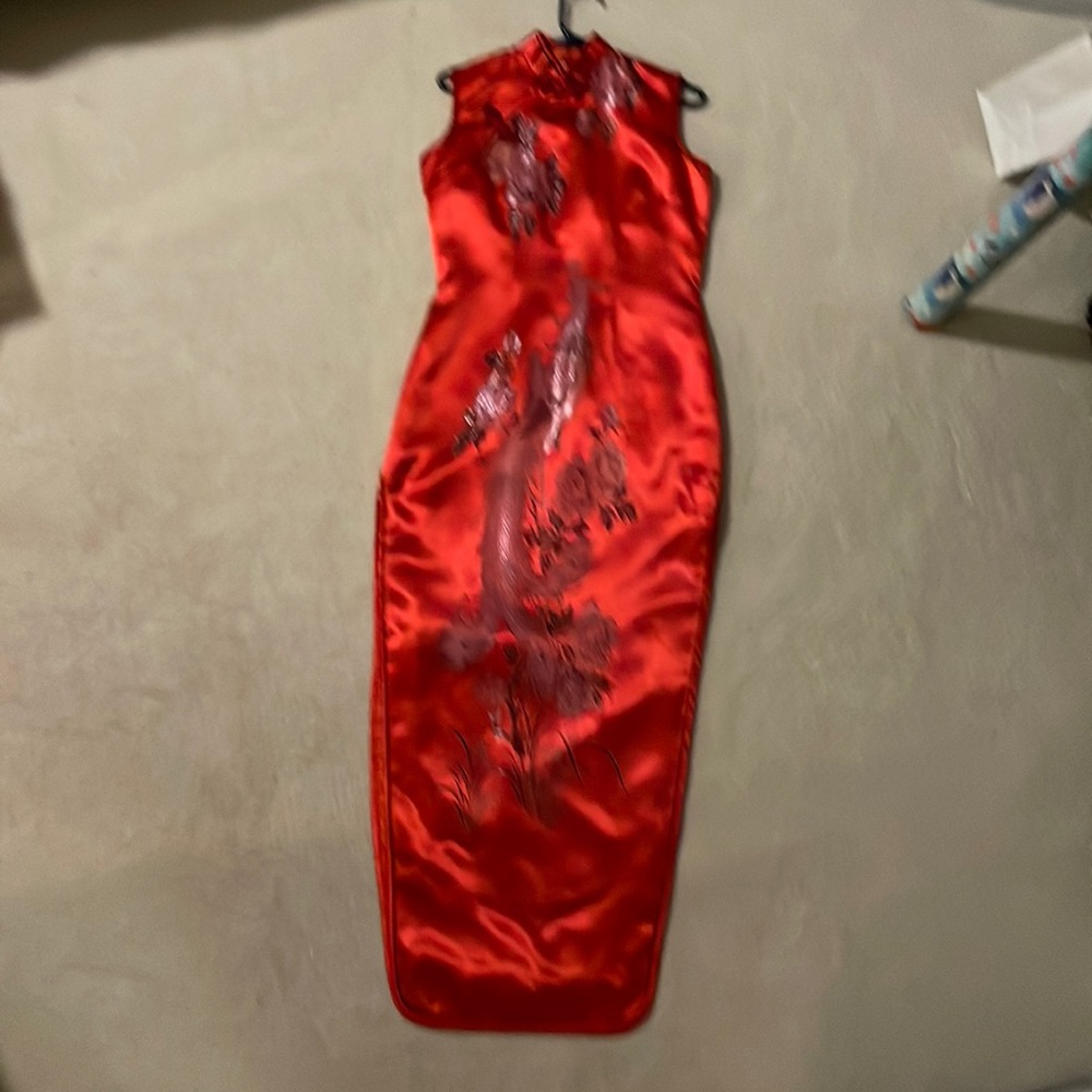 Beautiful silky red Chinese wedding dress with elegant phoenix embroidery